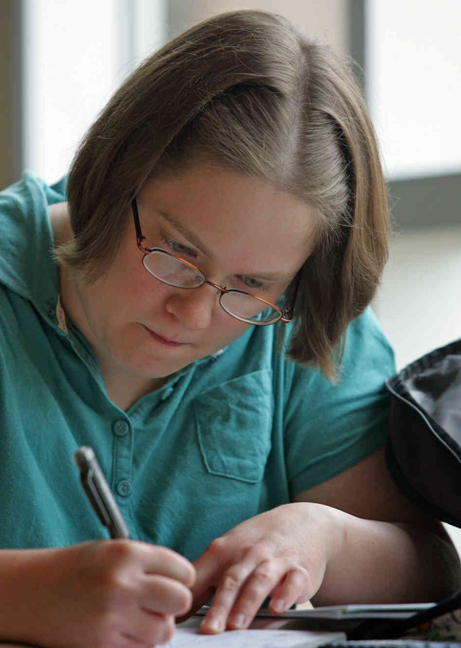 Lisa Daxer works on homework at Wright State University. Lisa Daxer works on homework at Wright State University.